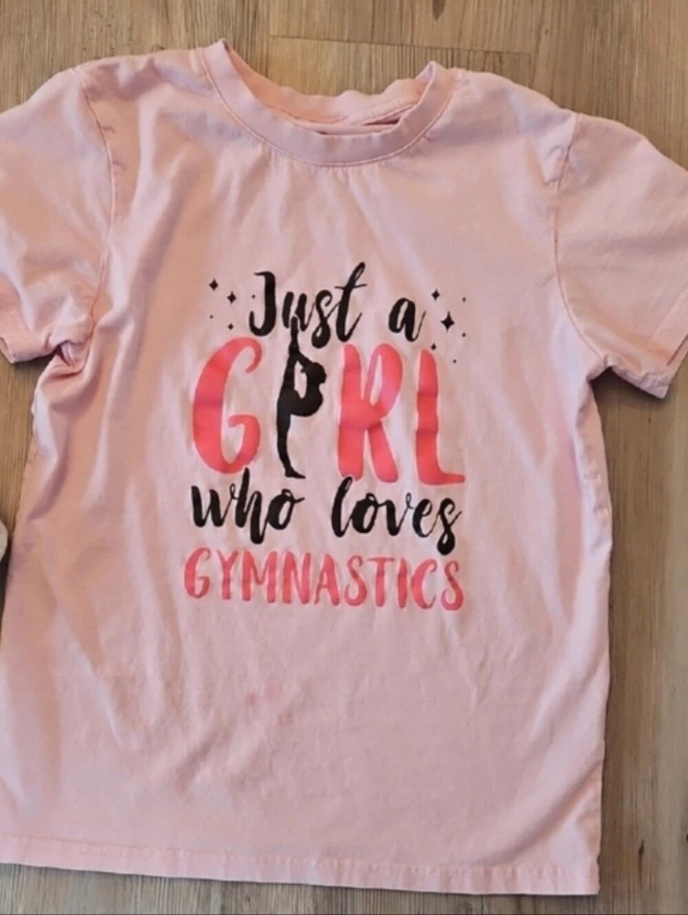 Girls Medium Pink “Just a Girl Who Loves Gymnastics” Graphic Tee